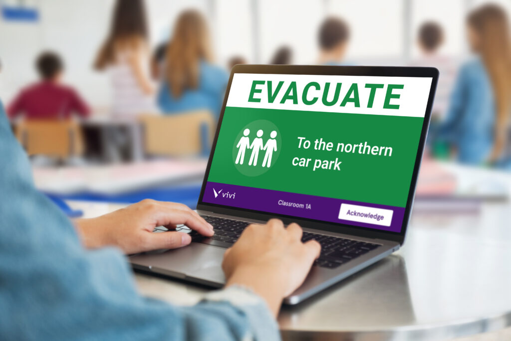 Teacher Acknowledging Alert Class Evacuating