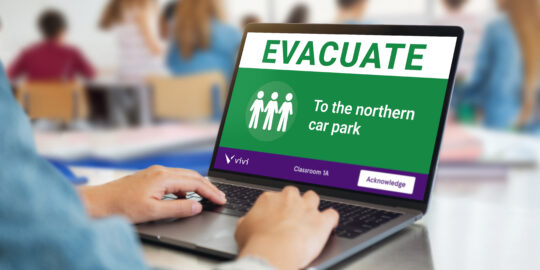 Teacher Acknowledging Alert Class Evacuating