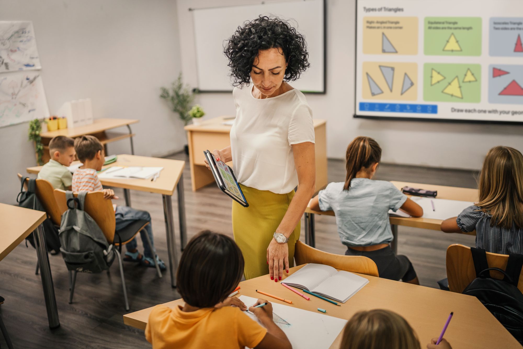Teacher in classroom using Vivi